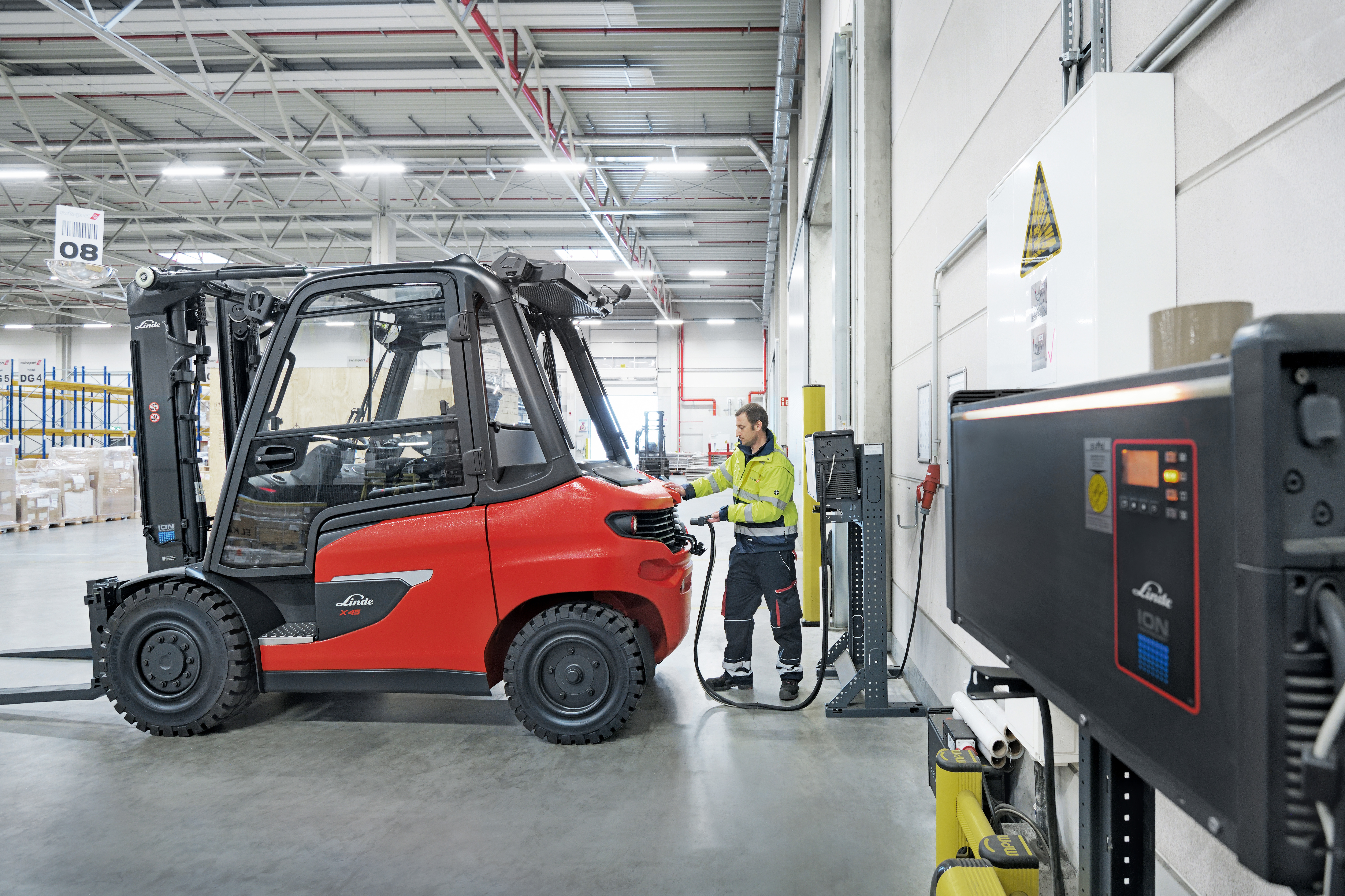Linde lithium-ion battery powered counterbalance forklift getting charged