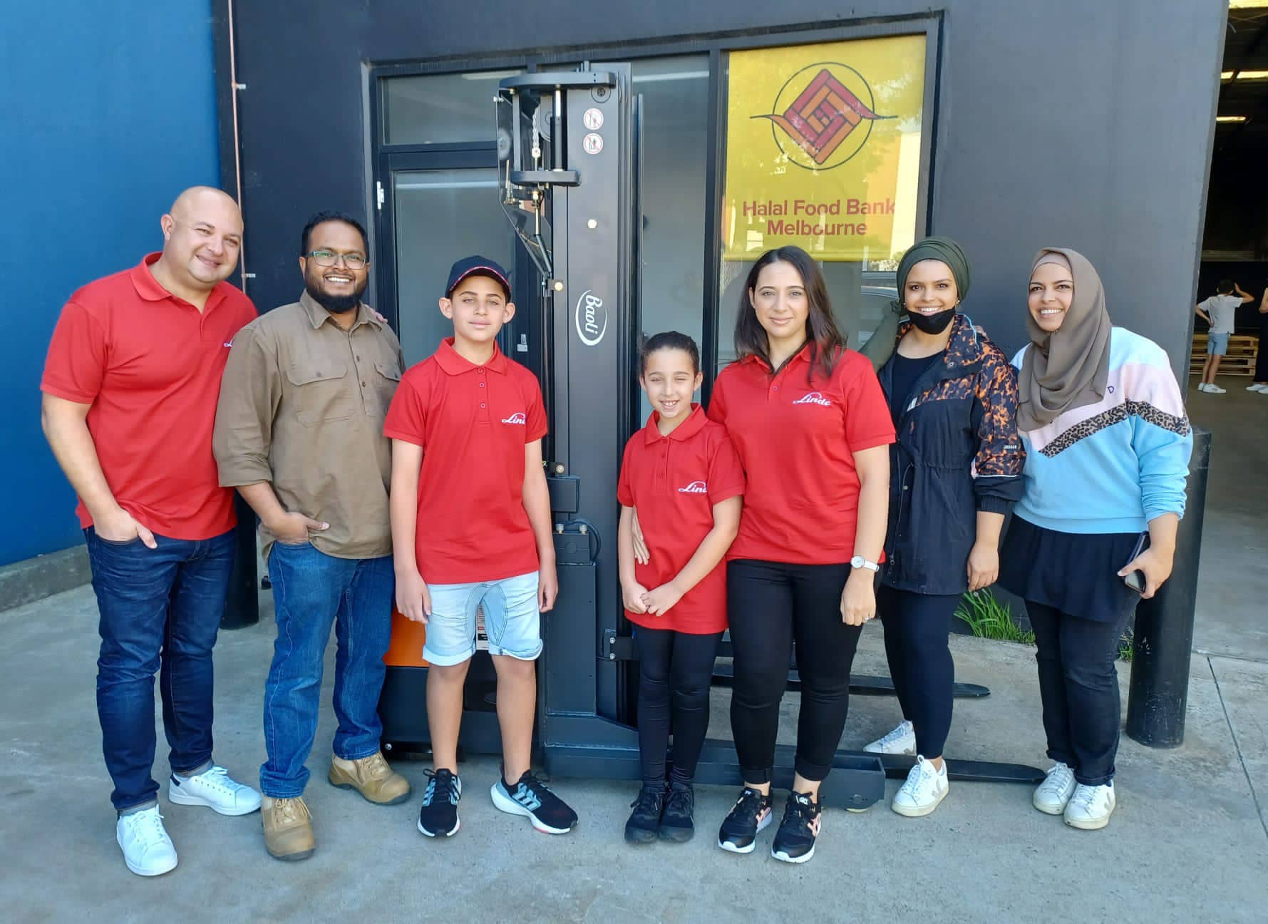 Alan and family volunteering at HFBM 